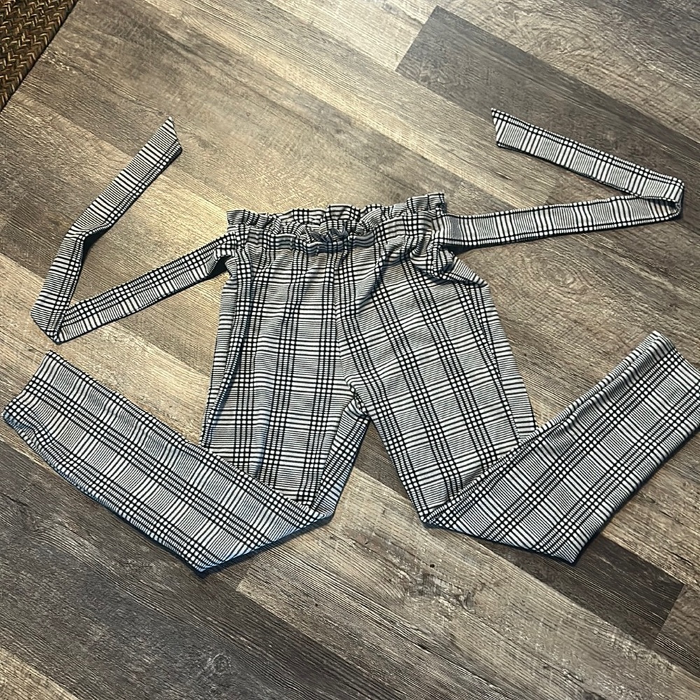 Black and white plaid dress pants with tie
